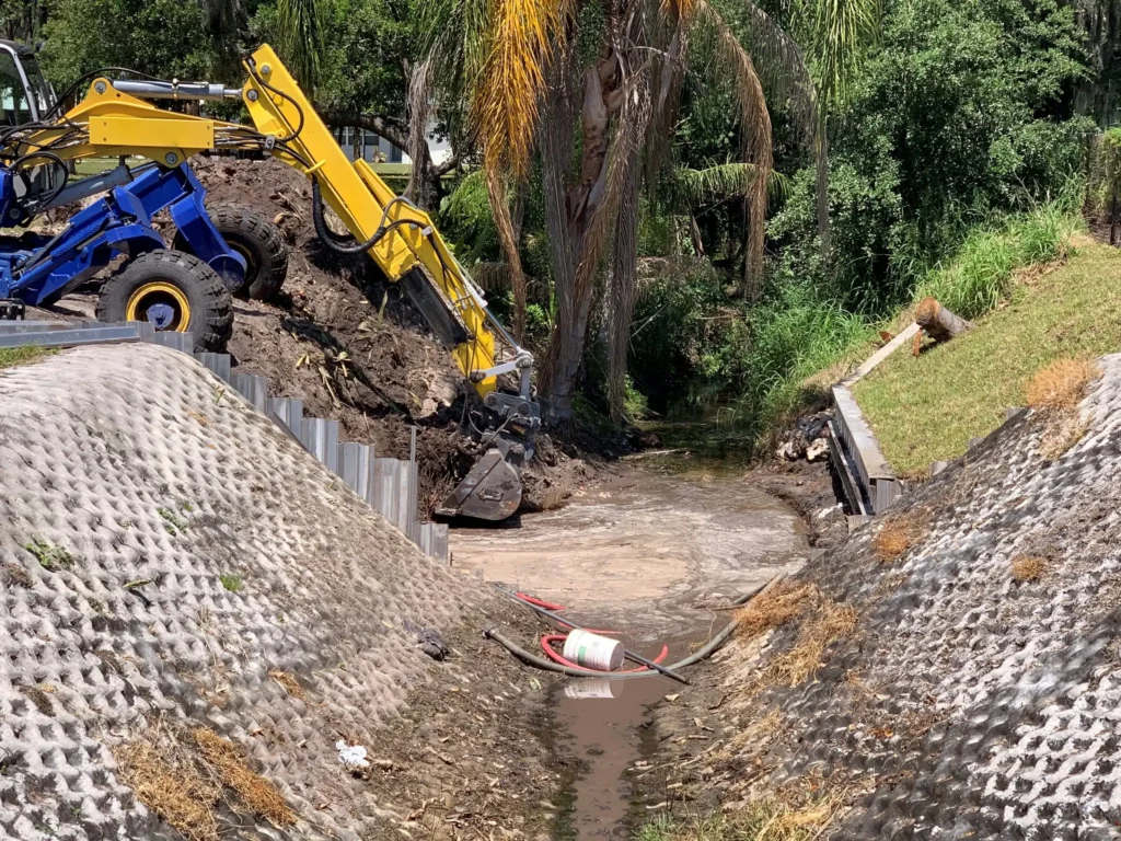 A cleared drainage ditch after district maintenance