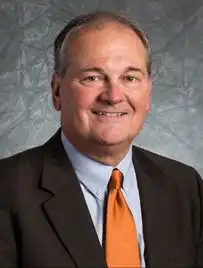 Portrait of Dr. Kevin Henne, Secretary of the Board of Commissioners